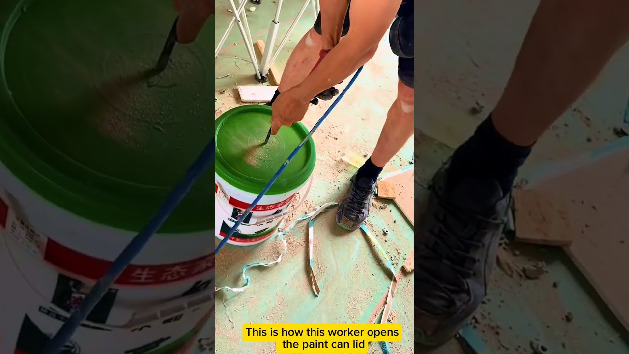 This is how this worker opens the paint can lid 