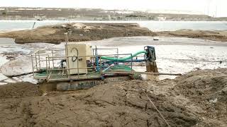 Industrial sludge lagoon cleaning   robotic barge