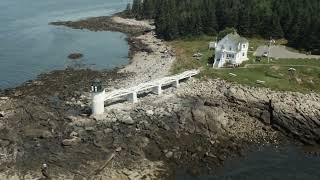 Drone aerial video of Marshall Point Lighthouse in Port Clyde, Maine
