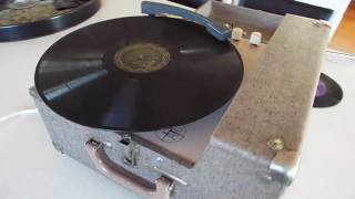 Airtronics 300A Classroom record player playing a 78 RPM record,.