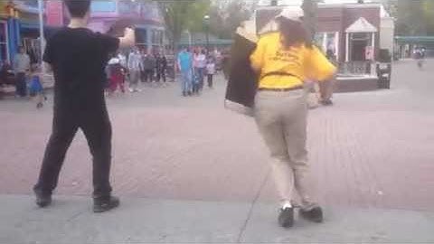 Crazy employee dancing at six flags