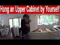 How to install an upper kitchen cabinet by yourself How to install an upper kitchen cabinet by yourself