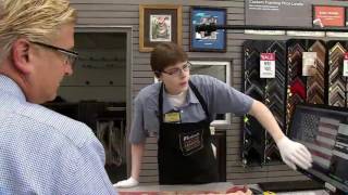 MICHAEL'S SURPRISES FLOOD-WEARY COUPLE WITH FRAMED AMERICAN FLAG