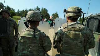 Texas National Guard soldiers practicing riot control