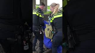 Protesters chain themselves to railway in Rotterdam over alleged arms shipments to Israel