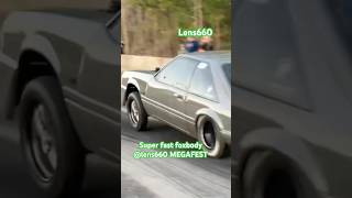Wicked fast foxbody on the backside #lens660 #backside #dragracing #megafest #grudgeracing