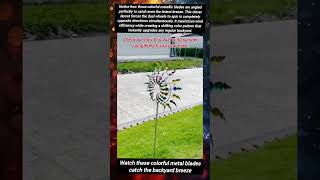 Watch these colorful metal blades catch the backyard breeze #BackyardDecor#WindSculpture#OutdoorArt