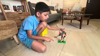 Ayaan making Lego Ferris Wheel