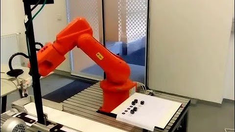 MCI - ABB robot cell, conveyor tracking with Cognex camera