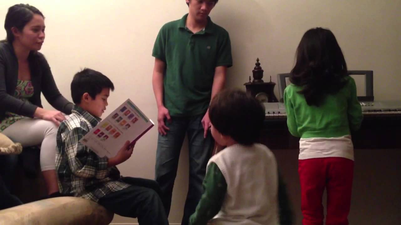 Fifi playing piano, while Adie's singing