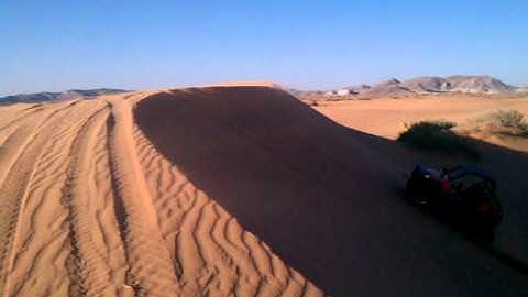 Polaris RZR S dune jump, Red Sands