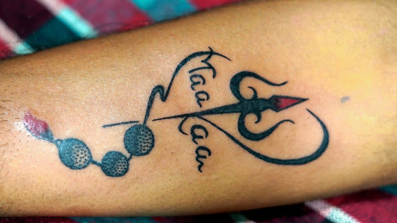 Trishul Or Rudraksh Ke Sath Maa Paa Name Ka Tattoo Maa Paa Name trishul-or-rudraksh-ke-sath-maa-paa-name-ka-tattoo-maa-paa-name