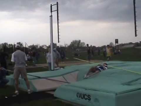 Alexandra Graham from Wisconsin Lutheran HS vaults at a Watertown meet May 2007. Allie warmed up great, as usual, but the bar goes up ... and her feet come down. I was sure she would PR with 10' at least today, but a poorly timed storm move through and the wind changed to a headwind. She comes in at 8' and blew it away, then we passed to 9' 3" to try to get the vaults in before the headwind ... it was too late. She stalled in the wind and came up short on 9' 3". Her new PR would have to wait.