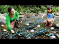 Mother with daughter found catch lobster and pick duck eggs for food of survival in forest
