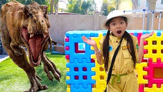 Emma and Andrew Digging with Beach Sand Toys and Find a Dinosaur