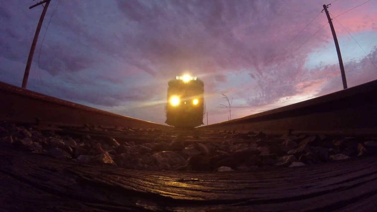 Train runs over GoPro - YouTube