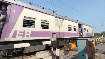 Crossing : Different Model EMU Local Trains at busy Railgate