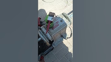 thread cutting machine in use.