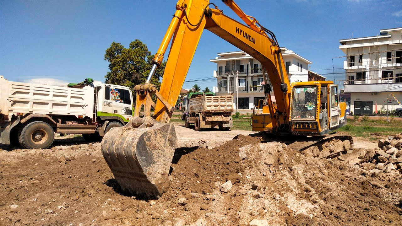 Dig Operation Excavators Digging Operation And Loaded Into Dump Trucks For The ...