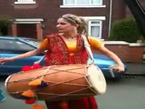 Pakistani Girl Playing with Dhol In UK.  must see and comments Please.flv