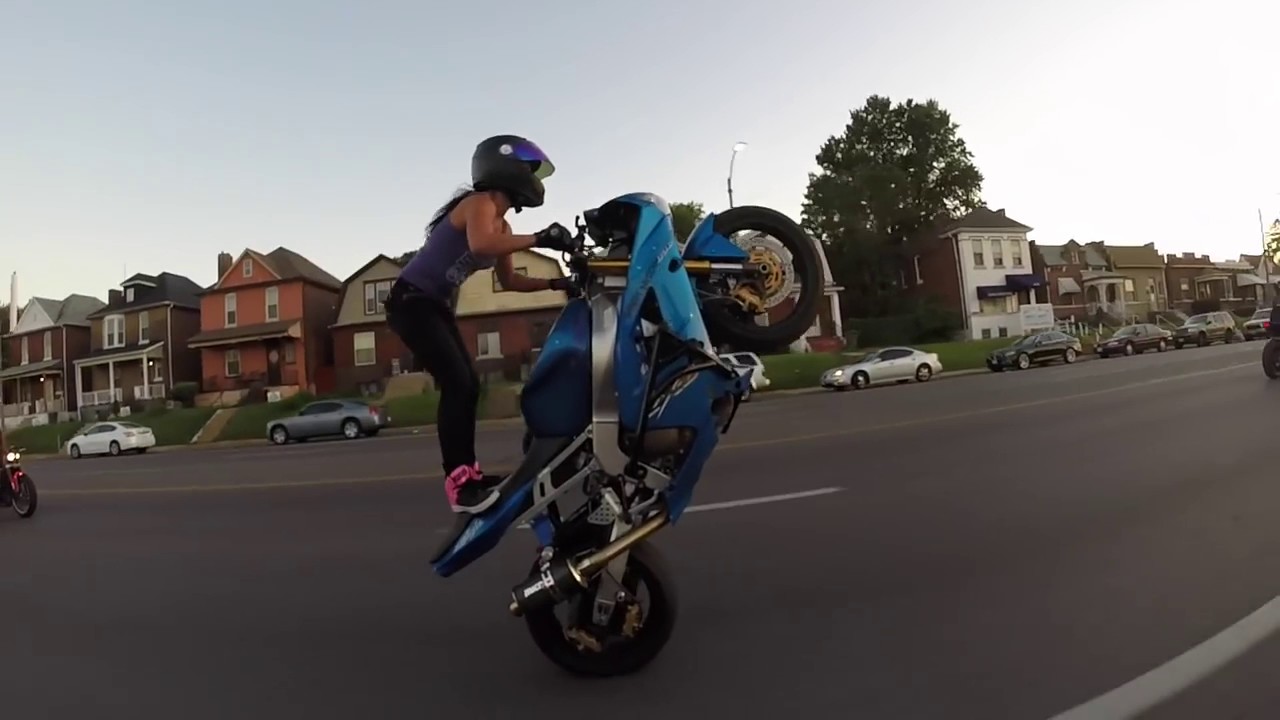 girl bike stunt