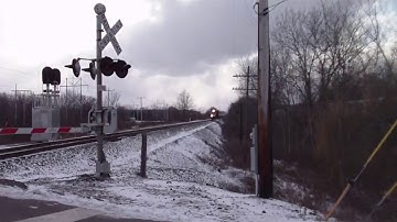 Standing Between 2 Fast Moving  Freight  Trains