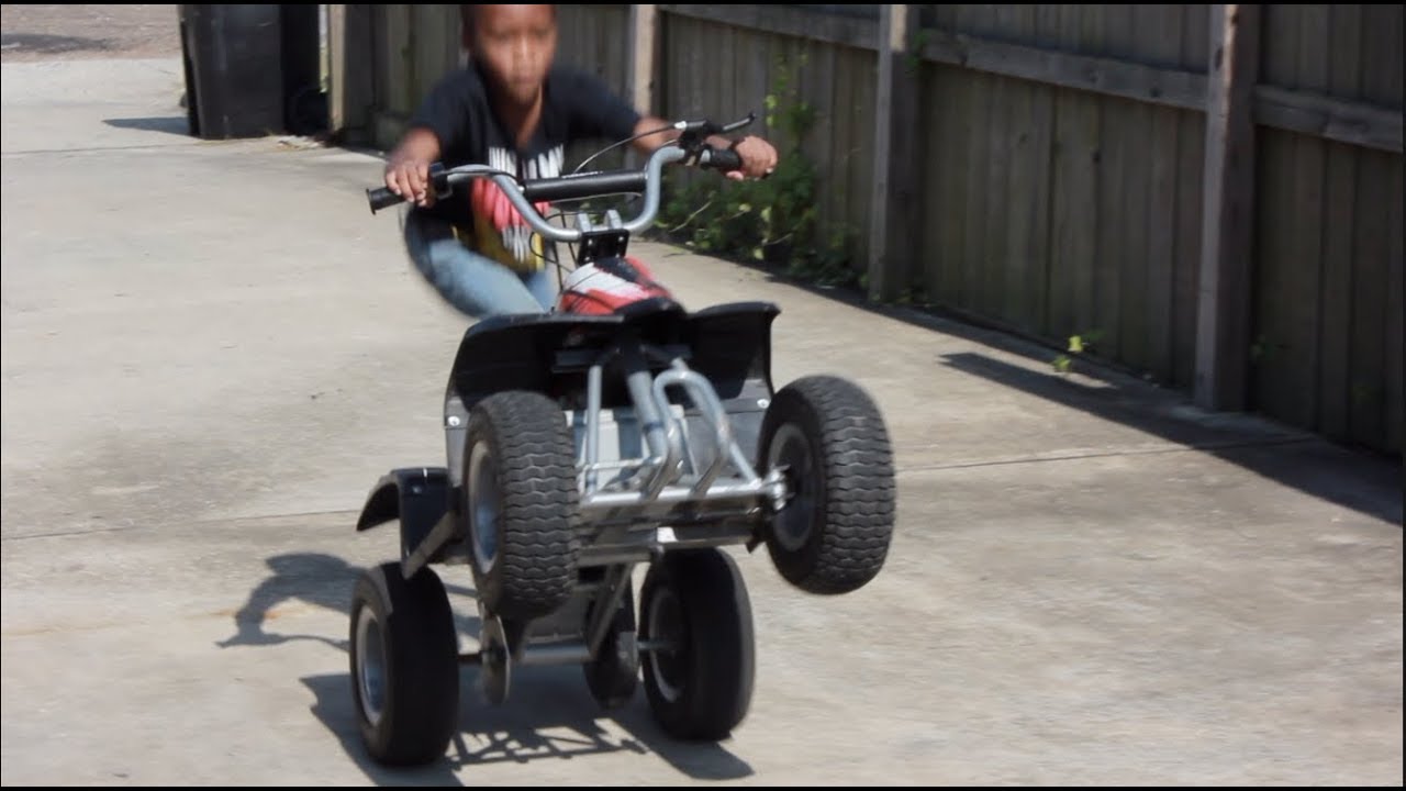 6 years old Kid wheelies fourwheeler YouTube