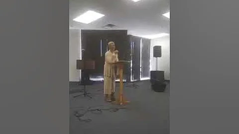 Minister Joyce Byrd singing "Amazing Grace"
