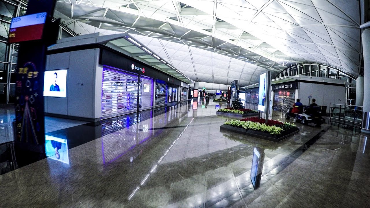 Hong Kong Airport. A Long Walk Through Gates, Shops and the Cathay Pacific  Business Lounge