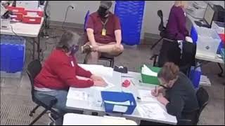 Two workers literally filling out ballots. | ELECTORAL FRAUD FULL VIDEO 2020