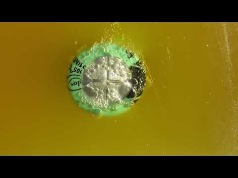 Capacitors explode in mineral oil and H2O