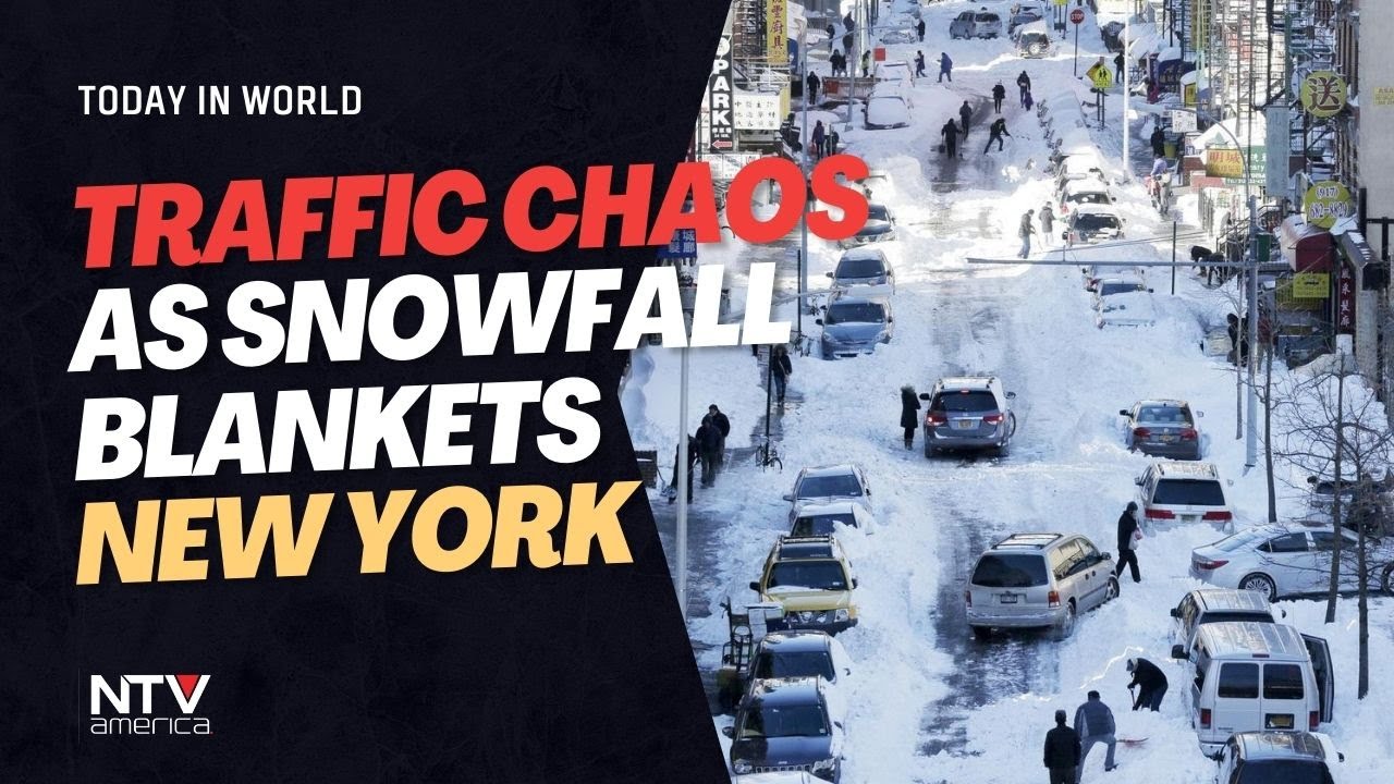 Traffic chaos as snowfall blankets New York - YouTube