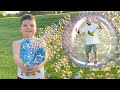 Calebs bubble blaster bug hunt with mom and dad backyard adventure outside with new bubbles toy