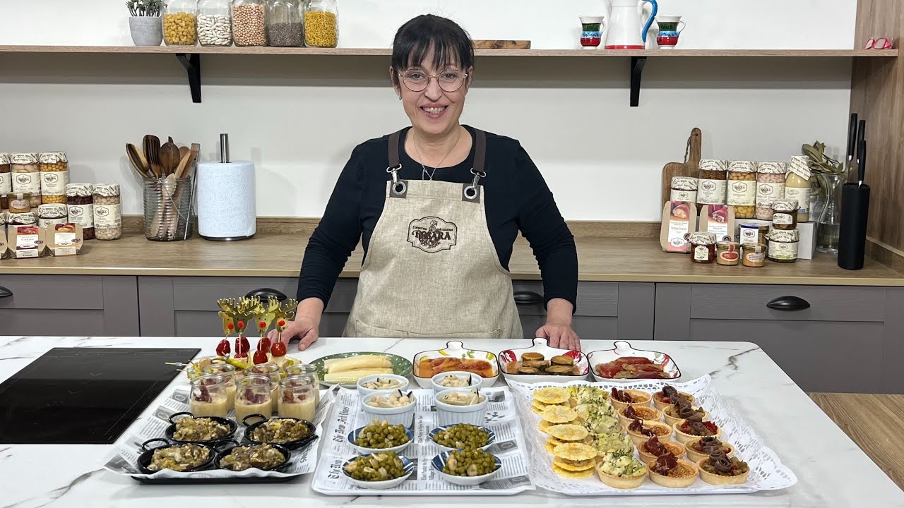 Mesa de entrantes con conservas