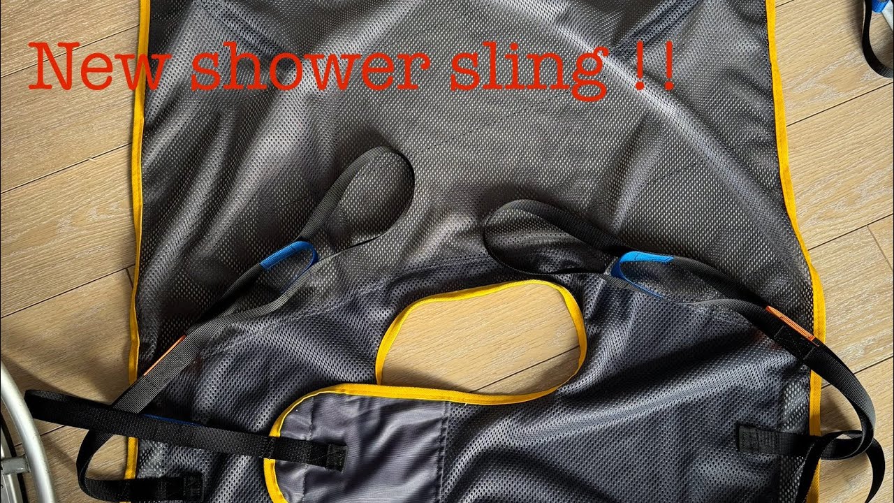 New sling for a shower and phone call from wheelchair service. - YouTube