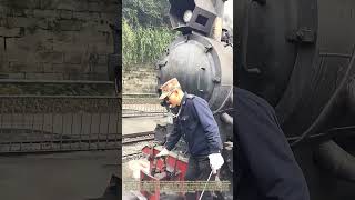 Coupling the Past: How a Rail Worker Connects a Steam Locomotive to Cars