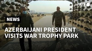 Azerbaijani president visits park displaying military trophies from Karabakh war | AFP