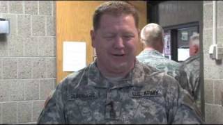 Soldier Promoted During Flood Duty as Wife Watches from Overseas