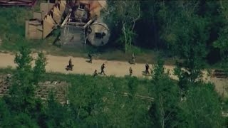 Manhunt continues for suspects accused of killing Fox Lake officer