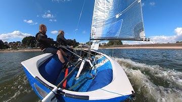 Tricky Merlin Rocket tight reach to reach gybe in a gust!