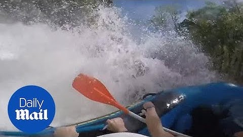 Rafter rescued after terrifying capsize pins her against rock