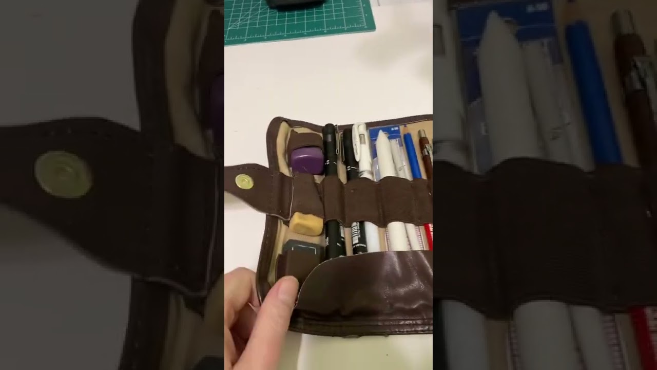 My graphite and charcoal drawing supplies in a Derwent pencil roll.