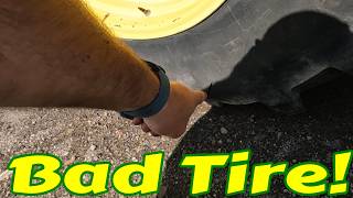 JOHN DEERE 7R 210 WITH WRONG TIRES ON IT.