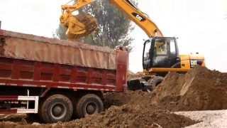 Cat® M315D2 and M317D2 Wheel Excavators in Action