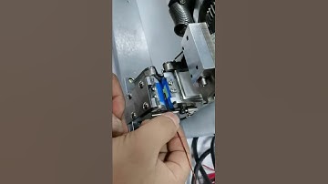 HH-345E  Tape Wrapping Machine is wrapping tapes on ends of copper conductor