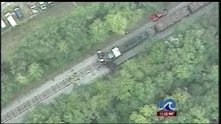 Tractor trailer and train collide, driver dies on impact