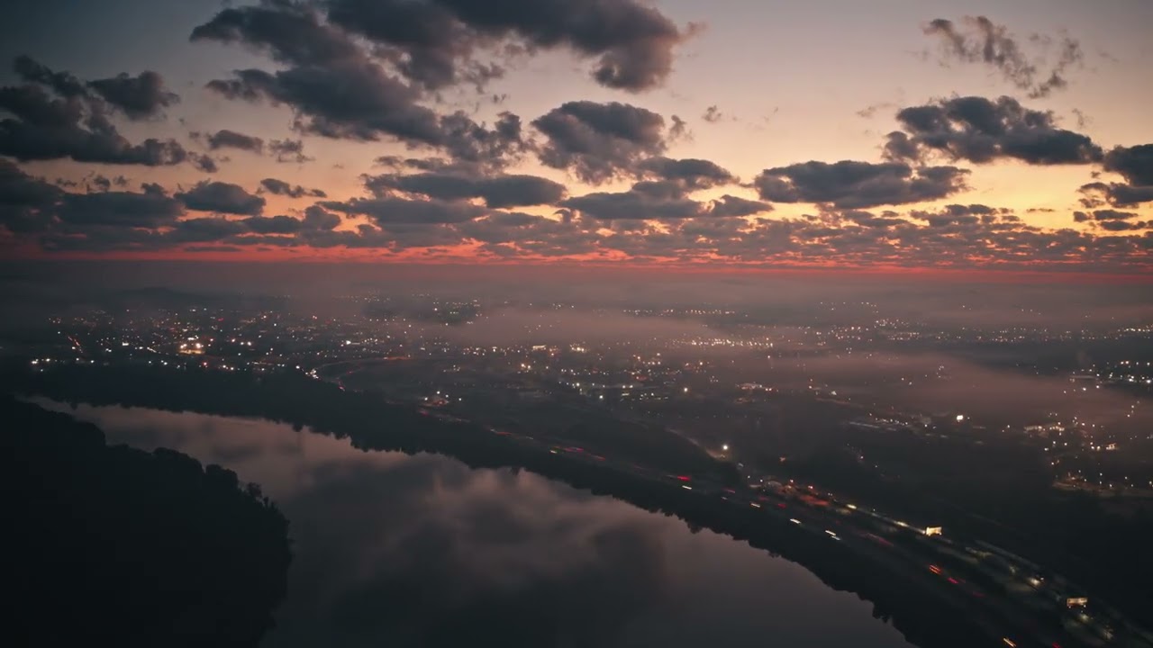 City Awakens: Aerial Vista of Dawn's Embrace 🌆🌄
