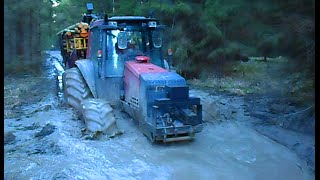 Valtra forestry tractor in wet forest