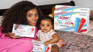 Mommy And Baby Trying Popsicles