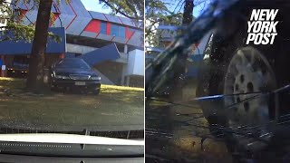 Cameras catch 96-year-old driver barreling over parked car | New York Post